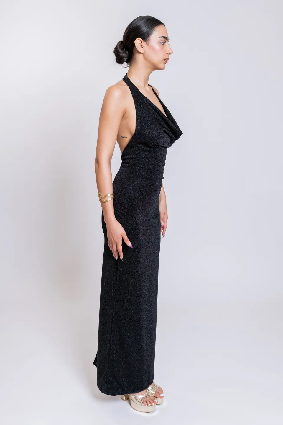 GALIA black cowl halter maxi dress in side profile with open back