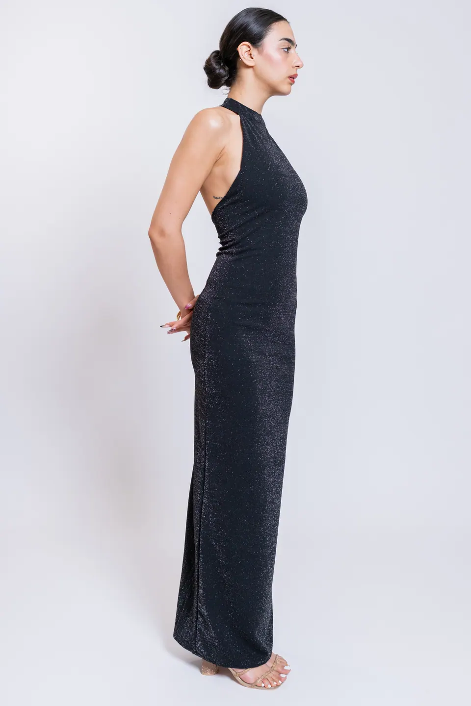CÉLINE black high halter maxi dress in side profile