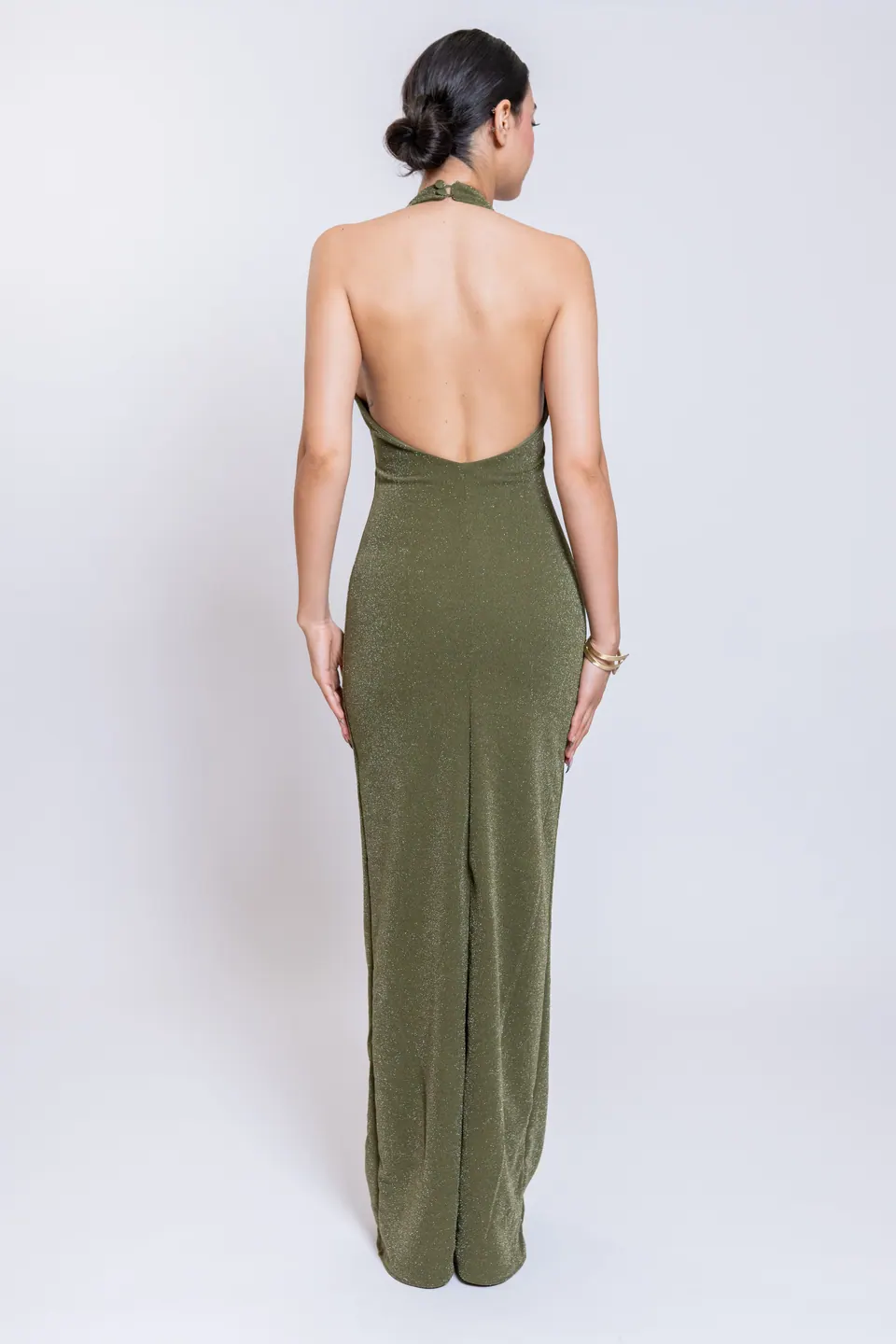 Back view of the CÉLINE olive green maxi dress with open back